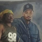 Rasta shows off his painting of Chris Brown (Photos)